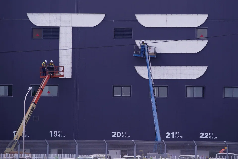 The workers say they welcome the award after Tesla has cut bonuses for many staff in the previous quarter.