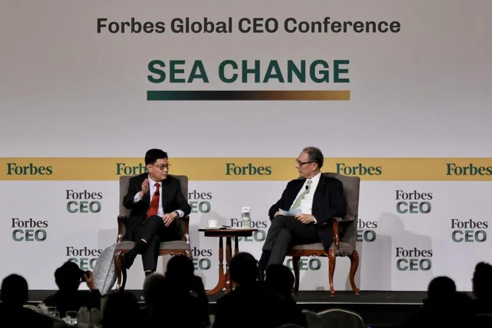 DPM Heng Swee Keat speaking with moderator Justin Doebele at a dialogue session during the Forbes Global CEO Conference at Shangri-La Singapore on Sep 11.