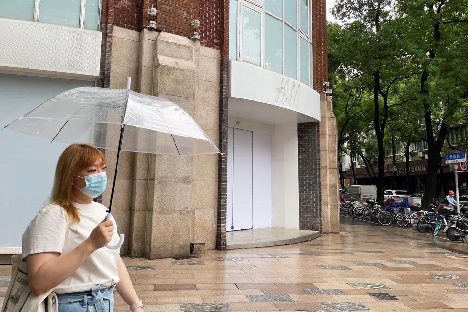 Although it was open earlier this month, the 3-storey building in downtown Shanghai was on Friday (Jun 24) boarded up with its H&M signage gone.