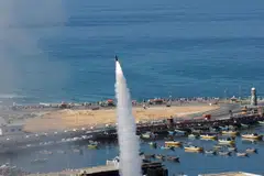 A rocket is fired by Palestinian militants into Israel, in Gaza City, Oct 7, 2023. 