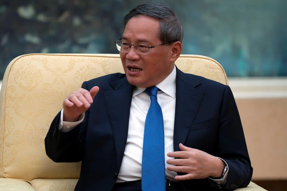 China will continue to introduce policies for boosting consumption and promoting investment, according to a cabinet meeting chaired by Premier Li Qiang (above).