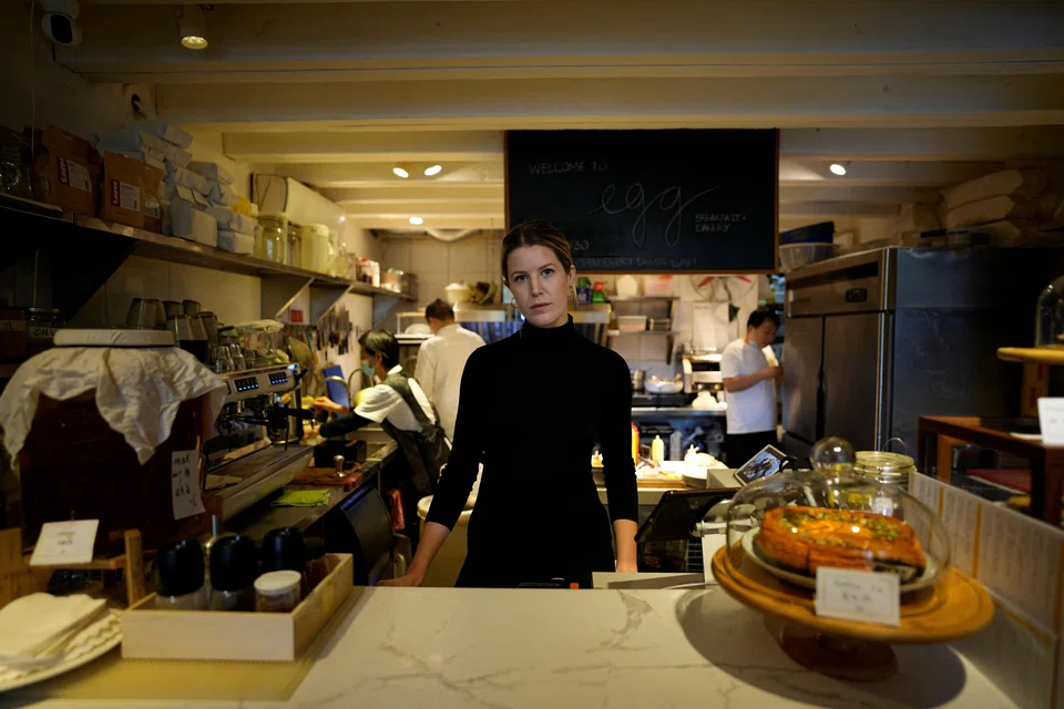 American entrepreneur Camden Hauge owns the Egg cafe in central Shanghai. "People are not going to flick a switch and go back to the way life was before," she says.