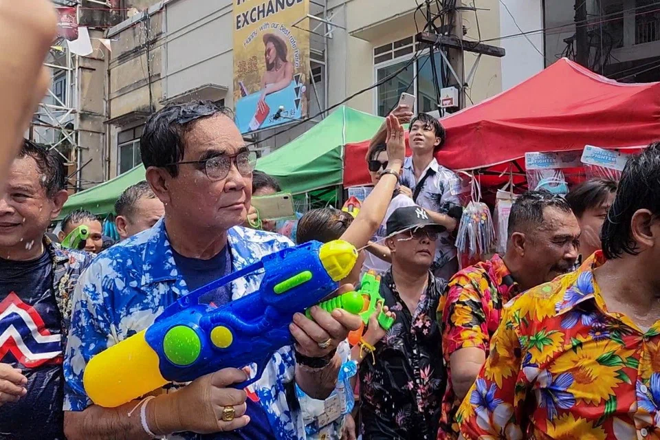 Dressed in the bright Hawaiian shirt traditionally worn at the Thai New Year festival Songkran, Thailand's Prime Minister Prayuth Chan-ocha showed up unannounced at Bangkok’s famous Khaosan Road and was the instant target of throngs of revellers armed with buckets and water guns.