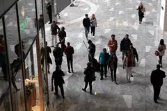 People shop in the Hudson Yards Mall in New York City. U.S. US President Joe Biden's team is still looking at options on whether to cut tariffs on Chinese imports to ease inflation, even as industry requests to maintain the duties mounted.
