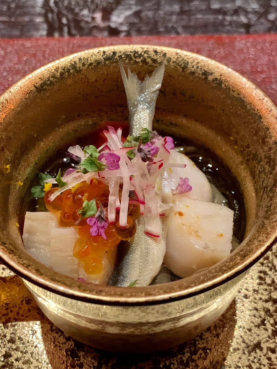 Appetiser of mixed cold seafood in ponzu sauce