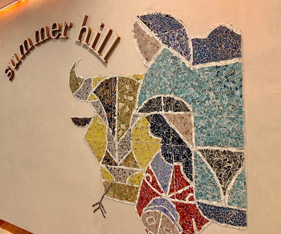 Summer Hill's mural tries to brighten up a dull walkway in Claymore Connect.