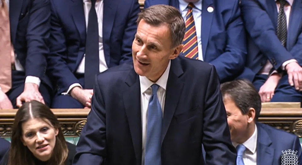 Britain's Chancellor of the Exchequer Jeremy Hunt has ruled out a major spending spree or big tax cuts in his budget plan but confirmed a three-month extension of energy bill subsidies for households and extended a decade-long fuel duty freeze.