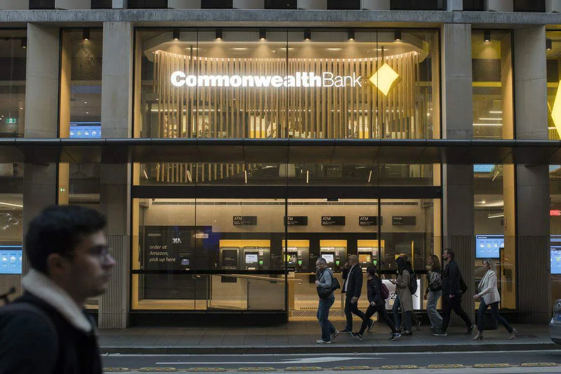 The Sydney-based bank warned of a challenging outlook as the twin economic pressures worsened the cost-of-living burden when it reported full-year earnings on Wednesday . 
