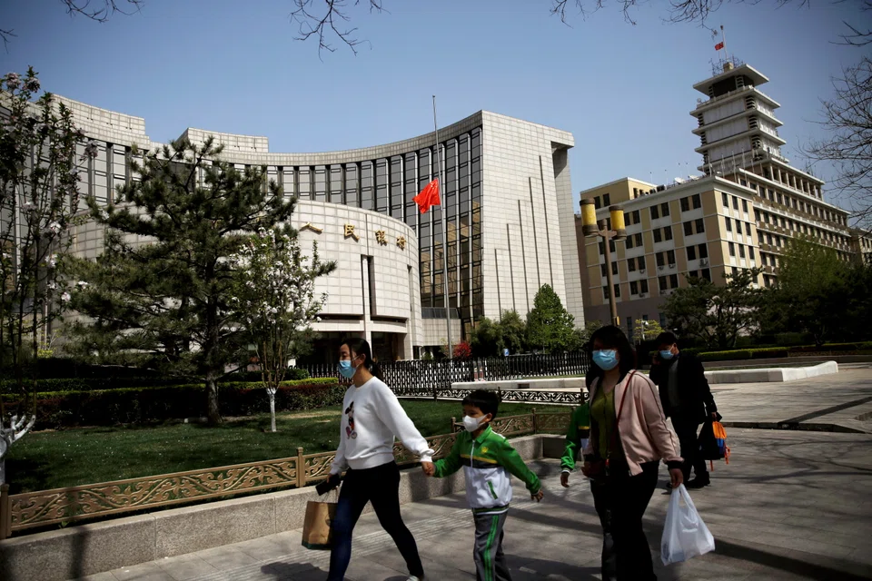 China's biggest state-owned banks lowered rates on some deposits of consumers in response to the government's call for help in backstopping the world's second-largest economy. 