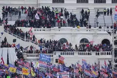 Pro-Trump protesters occupy the grounds of the West Front of the US Capitol, including the inaugural stage and viewing stands, in Washington on Jan 6, 2021.