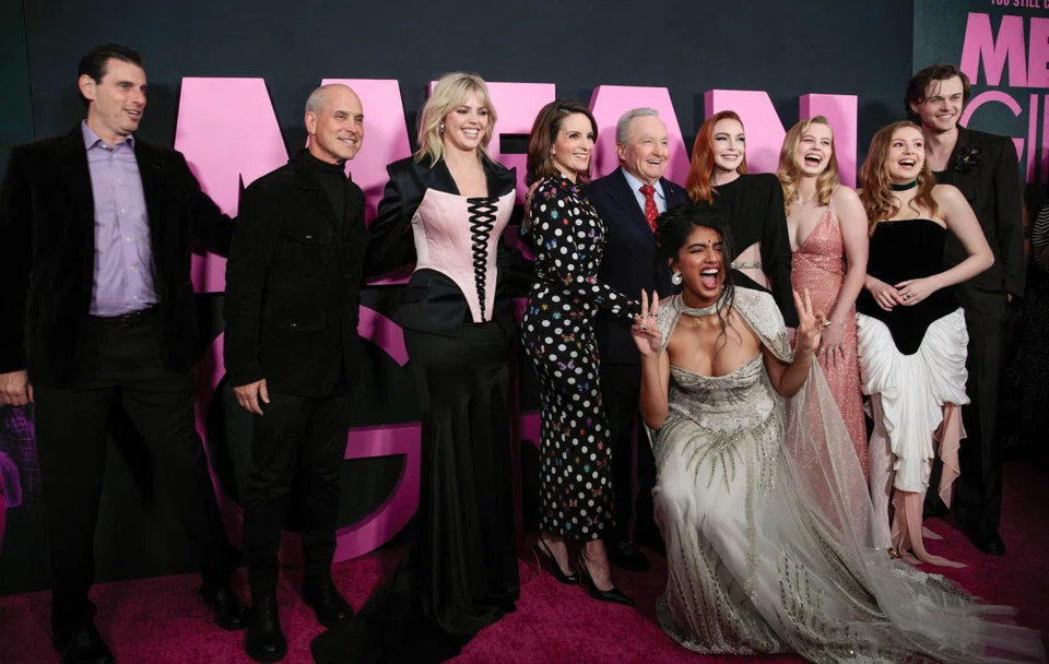 (From left): Marc Weistock, President and CEO of Paramount Pictures, Brian Robbins, Reneé Rapp, Tina Fey, Lorne Michaels, Avantika Vandanapu, Lindsay Lohan, Angourie Rice, Bebe Wood and Christopher Briney arrive for the premiere of Paramount Pictures' "Mean Girls" at AMC Lincoln Square in New York, US on Jan 8, 2024. 