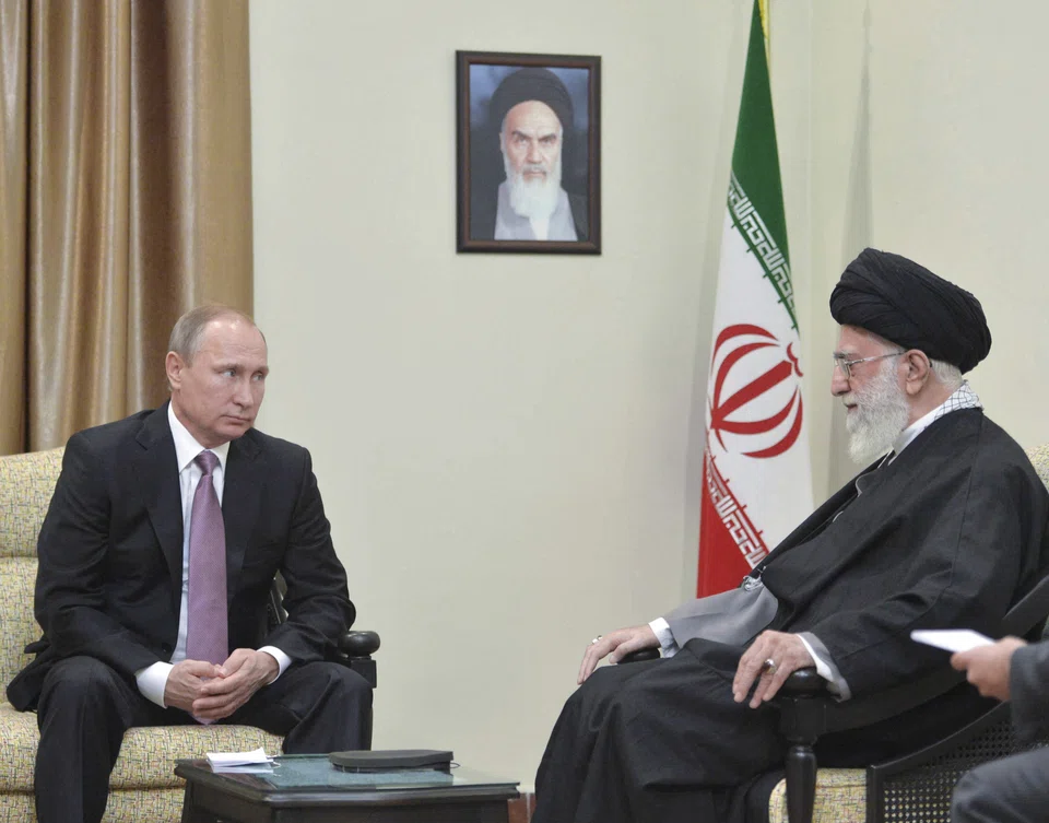 Russia's President Vladimir Putin (L) at his previous meeting with Iran's Supreme Leader Ayatollah Ali Khamenei in Tehran in 2015. 