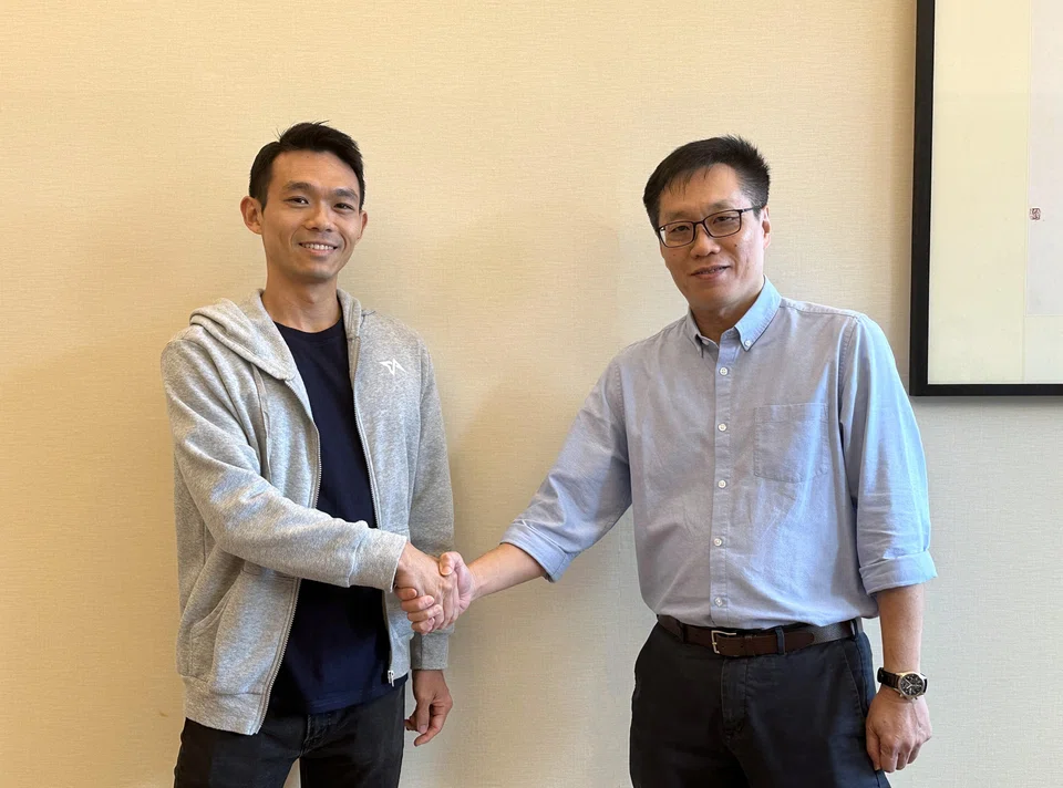 Willis Wee (left), chief executive and founder of Tech in Asia, and Wong Wei Kong, Editor-in-Chief of the English/Malay/Tamil Media Group in SPH Media.