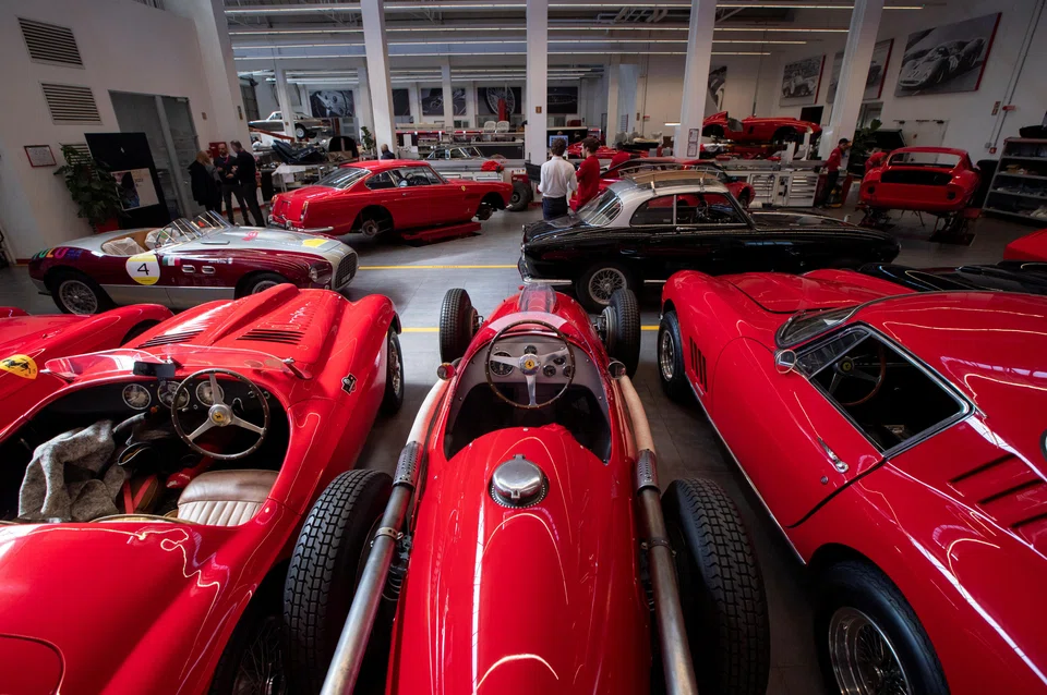 Ferrari Classiche cars in a garage at the Ferrari factory in Maranello, Italy; Ferraris are the most prized vintage autos, according to Adolfo Orsi, founder of the Classic Car Auction Yearbook, which has been tracking auction sales data since 1990, who described them as “absolutely the blue-chips of this sector”.