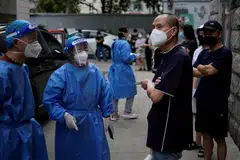 China will build more hospitals that specialise in treating moderate and severe Covid patients, and ensure that intensive care units account for 10 per cent of all hospital beds to tend to the most vulnerable patients.