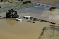Damage left by Cyclone Gabrielle in the Esk Valley near Napier on Feb 18 (Saturday). About 15,000 North Island households remain without power, mostly in the east coast cities of Gisborne and Napier, where floodwaters poured into many homes.