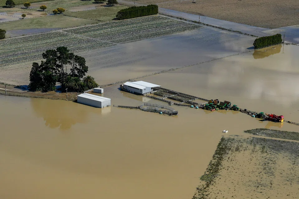 Damage left by Cyclone Gabrielle in the Esk Valley near Napier on Feb 18 (Saturday). About 15,000 North Island households remain without power, mostly in the east coast cities of Gisborne and Napier, where floodwaters poured into many homes.