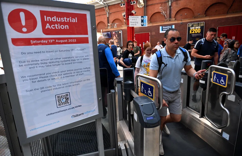 A public notice warning of industrial action at a train station in London, Britain, Aug 13, 2022. 