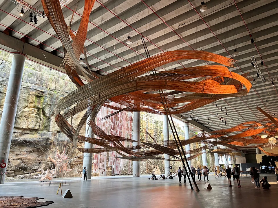 At the Cutaway, Australia design studio Cave Urban – comprising artists, architects and sculptors – has created a large bamboo installation that swirls and snakes across the ceiling like a winding river.