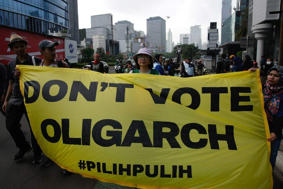 Activists at a rally in Indonesia. The key to defang identity politics is to transmit a fundamental message to voters: the government is working for you, not for elites of some kind or for friends in the party establishment.