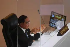 The opposition had needed more than 239 of the 477 parliamentary votes to oust the prime minister.