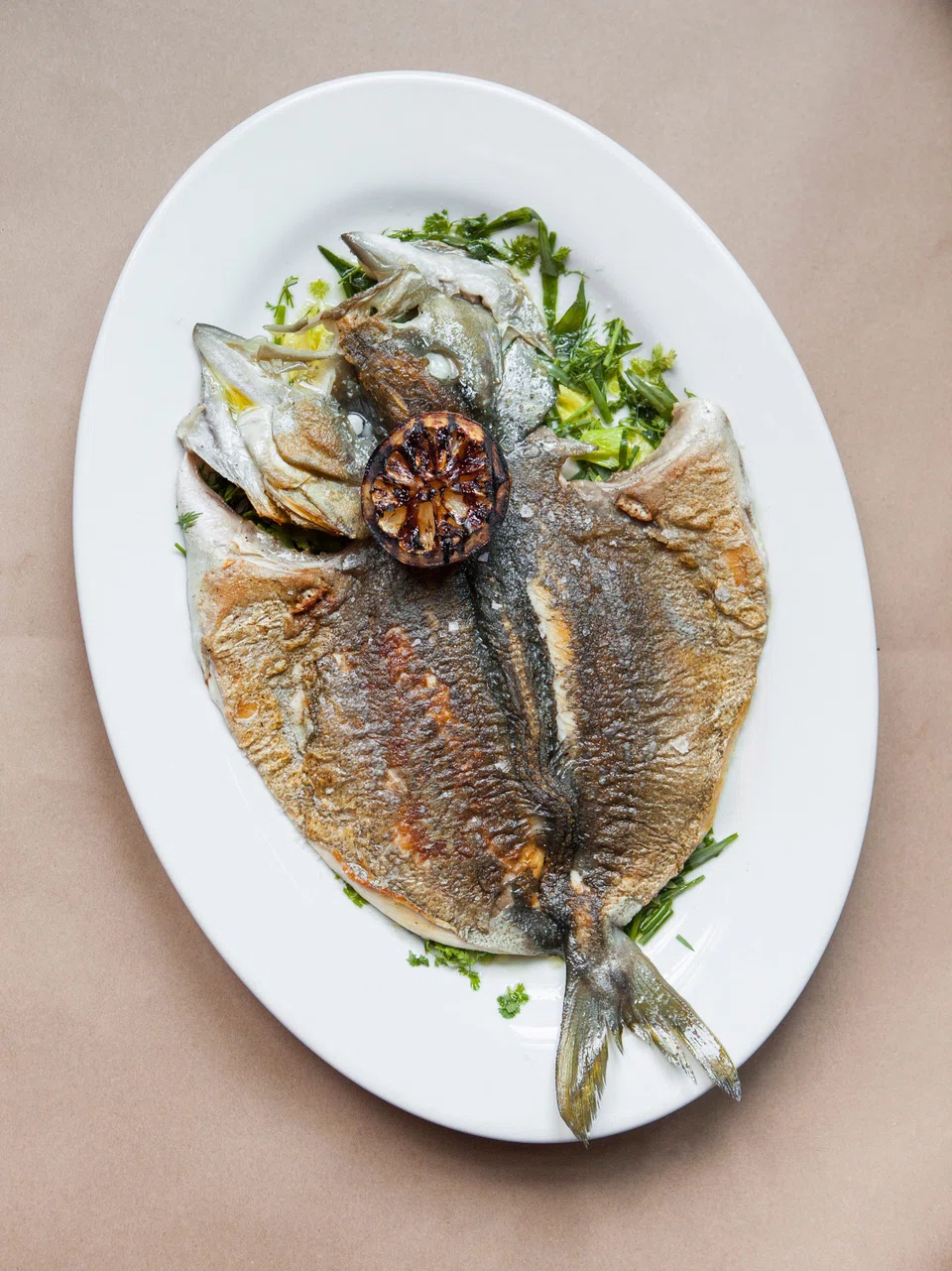Osteria Mozza's Whole Branzino alla Piastra.