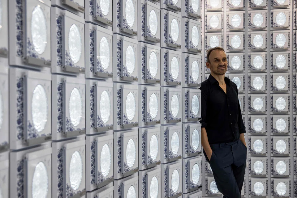 The sleek, modern building is the work of German architect Ulrich Kirchhoff, 52, who told AFP he tried to blend elements of nature into a high-density space to create a “neighbourhood village feel”.