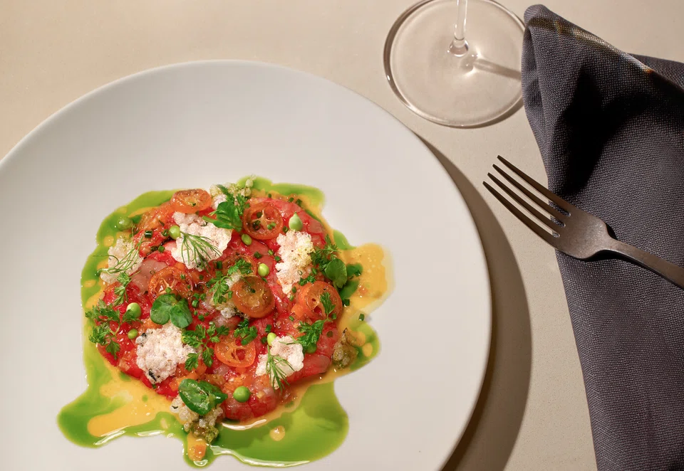 Refreshing crudo of red prawns and kumquats.