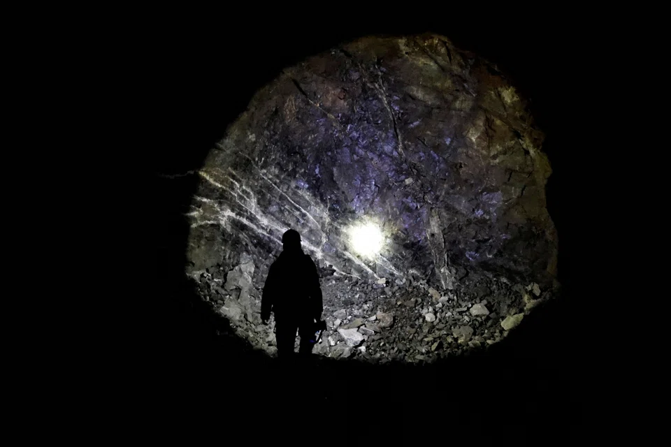 An employee guides inside a tungsten mine in Gangwon Province, South Korea, March 31, 2022. 