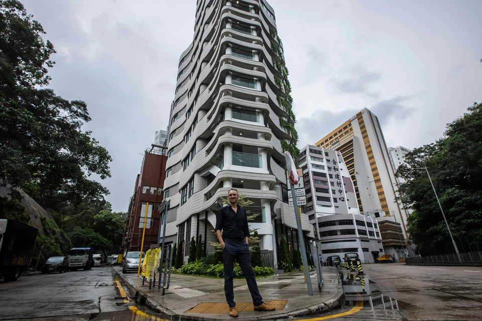 The sleek, modern building is the work of German architect Ulrich Kirchhoff, 52, who told AFP he tried to blend elements of nature into a high-density space to create a “neighbourhood village feel”.