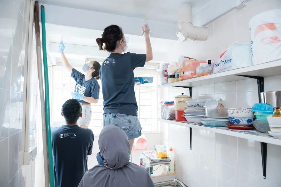 SingLand volunteers helping to clean a senior's home in Bendemeer. This year, the group clocked 64 per cent more volunteer hours than in 2022.