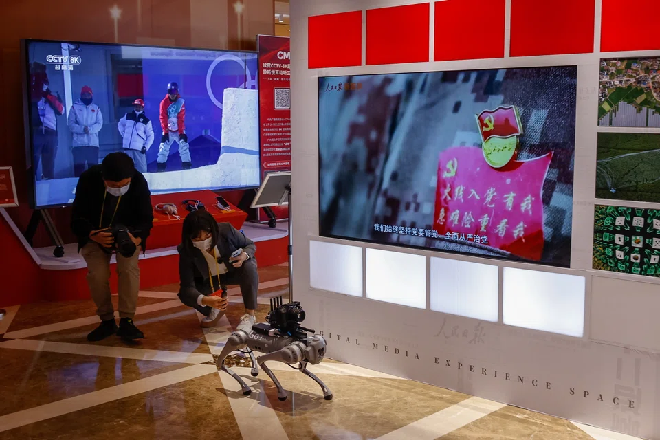 A robotic dog at the Digital Media Experience Space following a press conference at the Hotel Nikko New Century in Beijing on Monday (Oct 17). Reporters were briefed on how the Communist Party of China (CPC) will continue to exercise its strict self-governance over the party.  