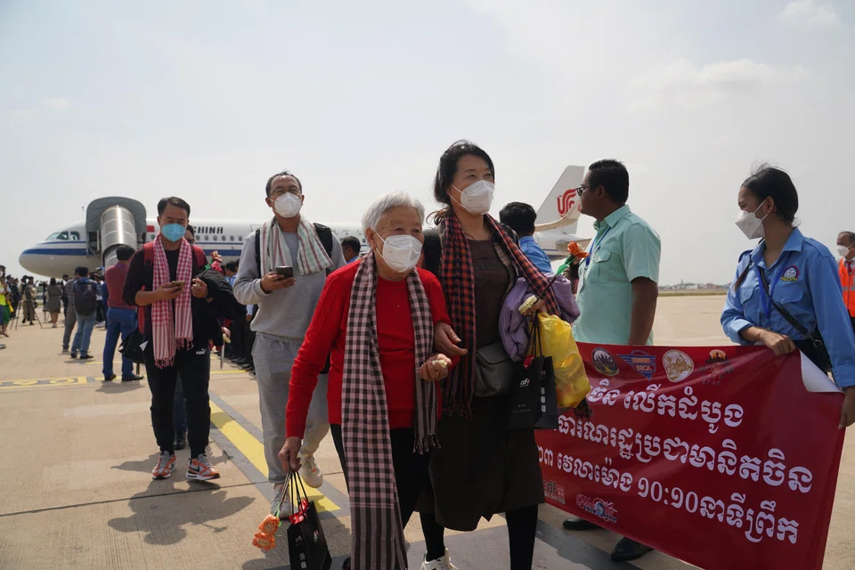 Passengers from Beijing arrive at Phnom Penh International airport after China reopens its borders amid the Covid-19 pandemic, in Cambodia, Feb 7, 2023. 