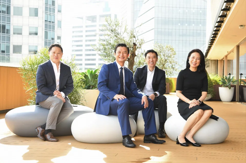 (From left) Metaverse Green Exchange co-founders Gabriel Wong and Bo Bai; Lee Shyong, managing director of partnership and innovation at OCBC; and Elaine Lam, head of global corporate banking at OCBC. 