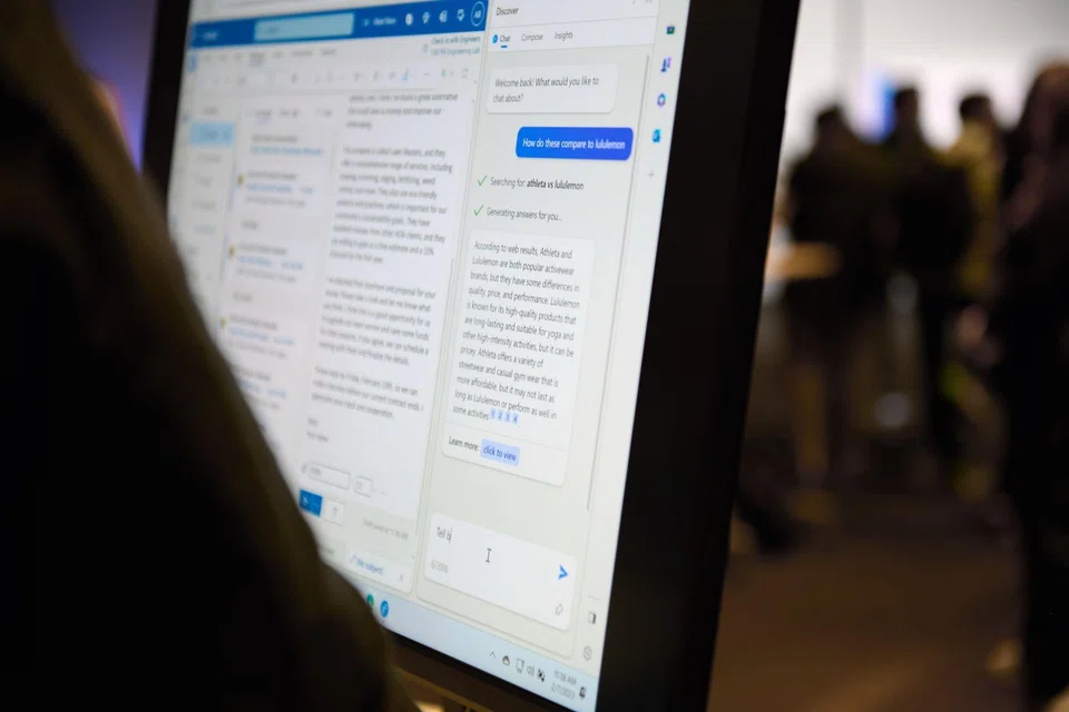 An attendee interacts with the AI-powered Microsoft Bing search engine and Edge browser at the company's headquarters in Redmond, Washington, Feb 7, 2023.