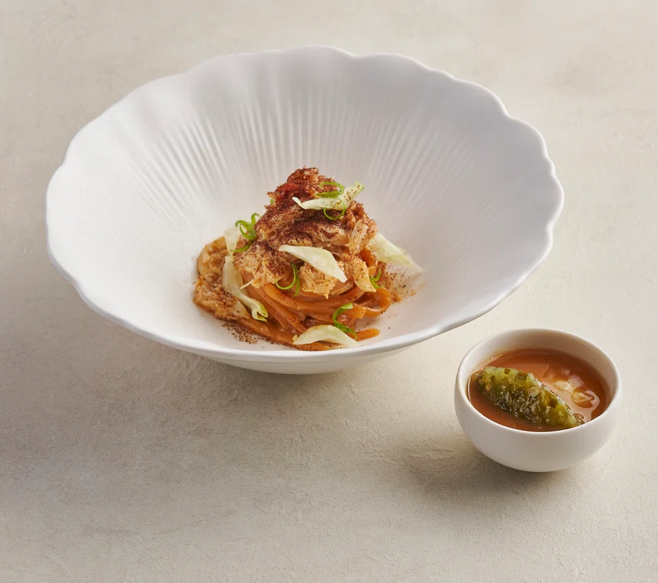 Noodles tossed in a rich chicken jus and paired with crab chawanmushi.