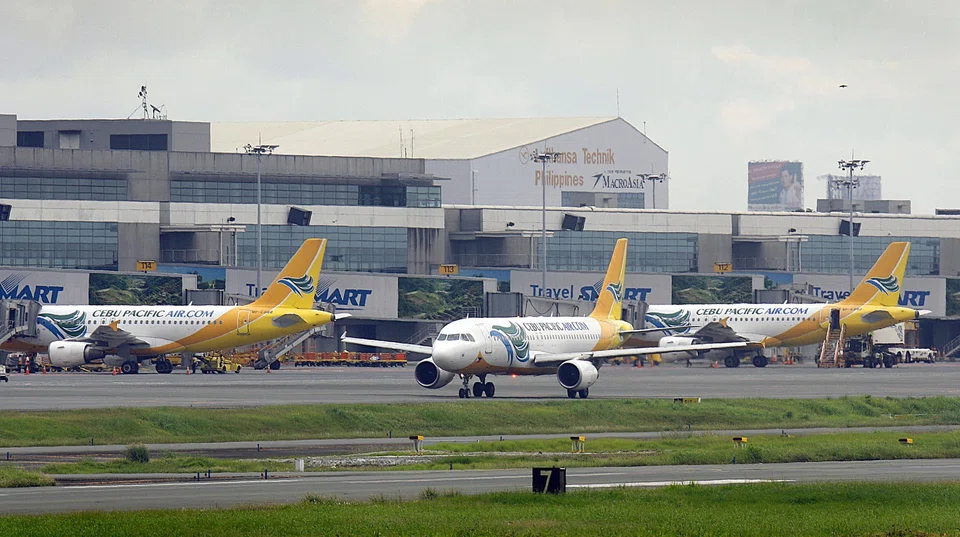 Cebu Pacifi Air planes at at Manila’s Ninoy Aquino International Airport Terminal 3. The flights identified were headed to Cebu, Bicol, Davao and Palawan and the warnings were received by e-mail by air traffic services.
