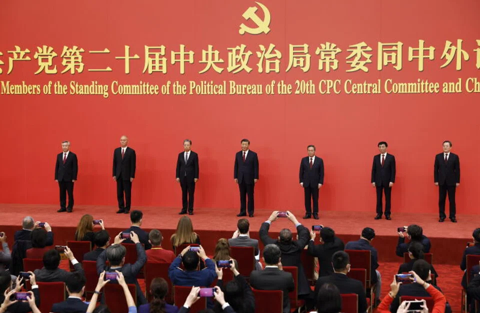 (Left to right) The new members of the Standing Committee of the Political Bureau of the 20th Chinese Communist Party (CPC) Central Committee Li Xi, Cai Qi, Zhao Leji, Chinese President Xi Jinping, Li Qiang, Wang Huning, and Ding Xuexiang attend a press conference at the Great Hall of People in Beijing, China on October 23, 2022. 