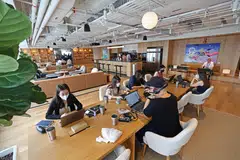 WeWork's premises at 21 Collyer Quay is the co-working operator's largest space in Singapore.
