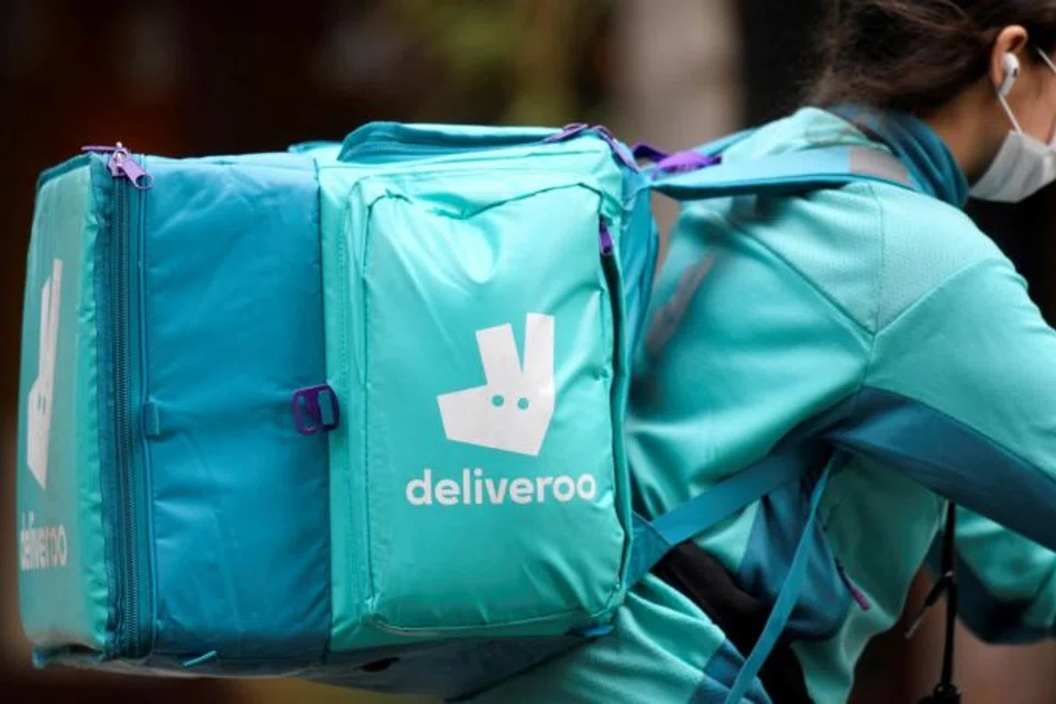 Deliveroo has suspended plans that would cut rider earnings in the United Arab Emirates after a rare strike by foreign delivery workers in the Gulf Arab state over working conditions disrupted services.