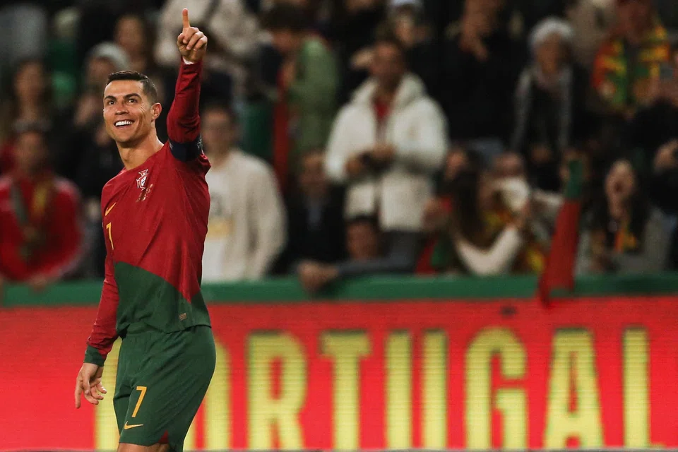 Portugal's forward Cristiano Ronaldo celebrates scoring his team's third goal during the Uefa Euro 2024 qualification match between Portugal and Liechtenstein at the Jose Alvalade stadium in Lisbon, Portugal, March 23, 2023.