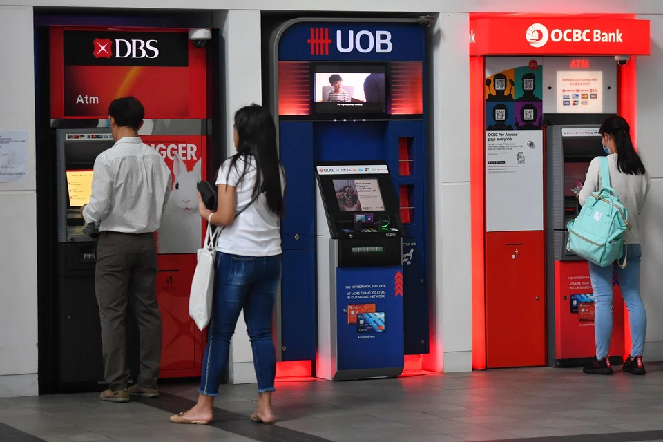 Shares of DBS, UOB and OCBC bucked the upside trend, as peaking interest rates mean a cap on their interest margins.