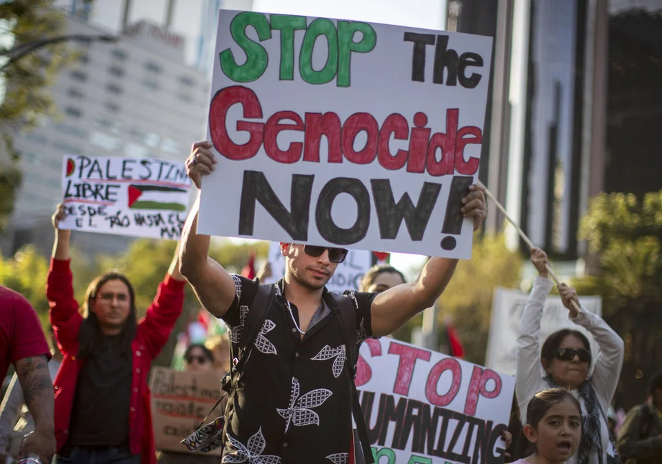 Protestors in Mexico calling for an end to what they termed a genocide against the Palestinian population, on Nov 5. 