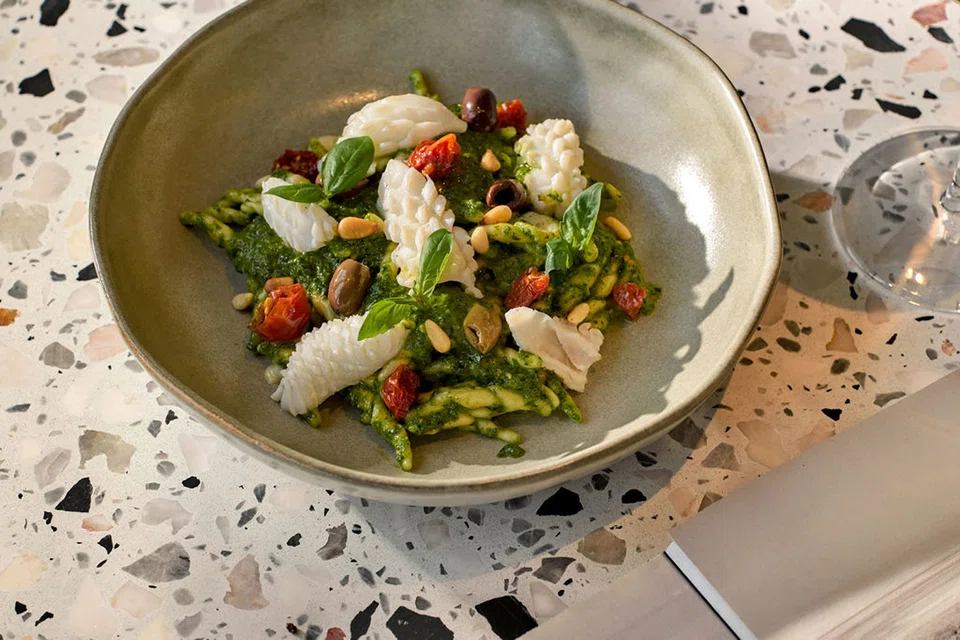 Trofie pasta in pesto sauce.