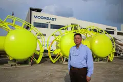 Mooreast Holdings founder and chief executive Sim Koon Lam with mid-water arch buoys that the company developed for Japan’s first commercial floating wind farm in Nagasaki.