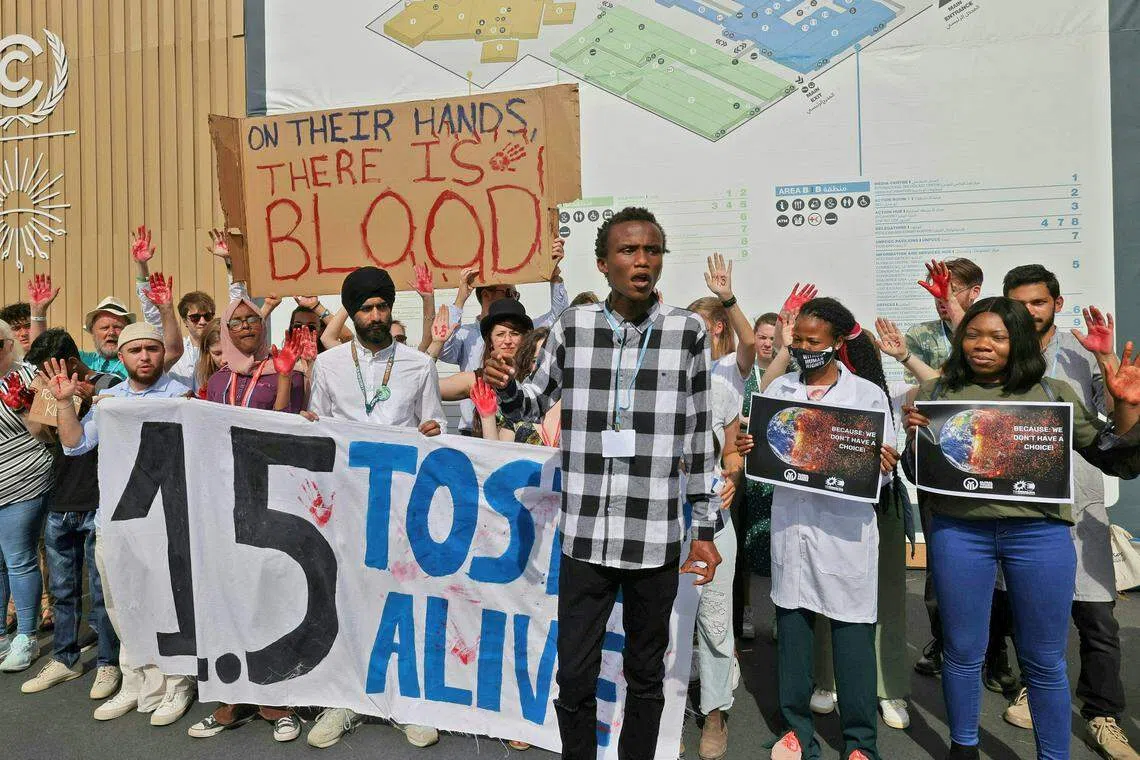 Climate activists at Sharm el-Sheikh calling on members of the G20 last week to stick to the temperature-rise limit of 1.5 deg C from pre-industrial levels. Developing countries and those likely to be hit by climate change can now claim the loss-and-damage fund as a diplomatic coup after years of pushing for it. But it could take years before they actually receive anything.