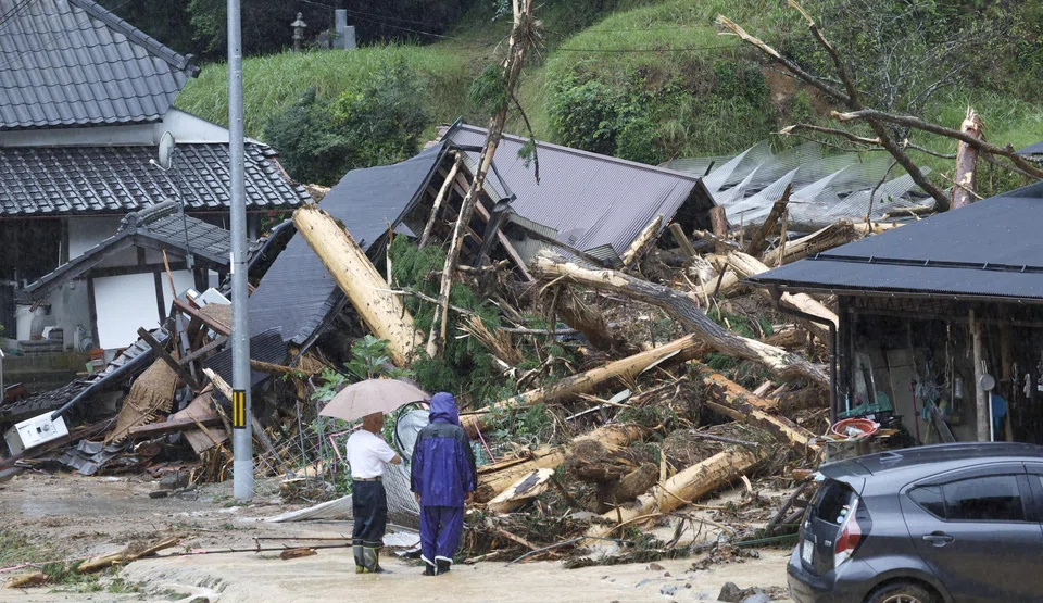 A landslide caused by Typhoon Lan in Ayabe, Kyoto prefecture, western Japan. At least 20 people were injured across five prefectures, including a man in his 60s, who was unconscious and in critical condition after the wall of a building collapsed on him.