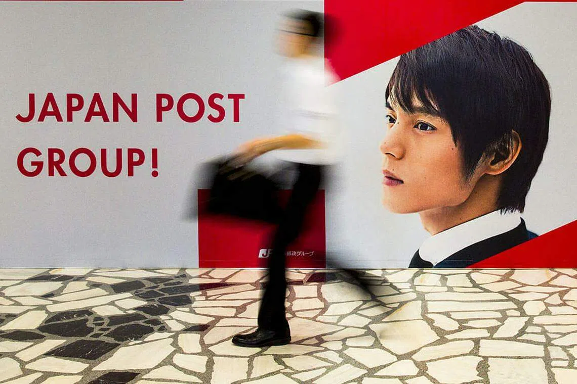 Japan Post sets IPO prices at top of their ranges