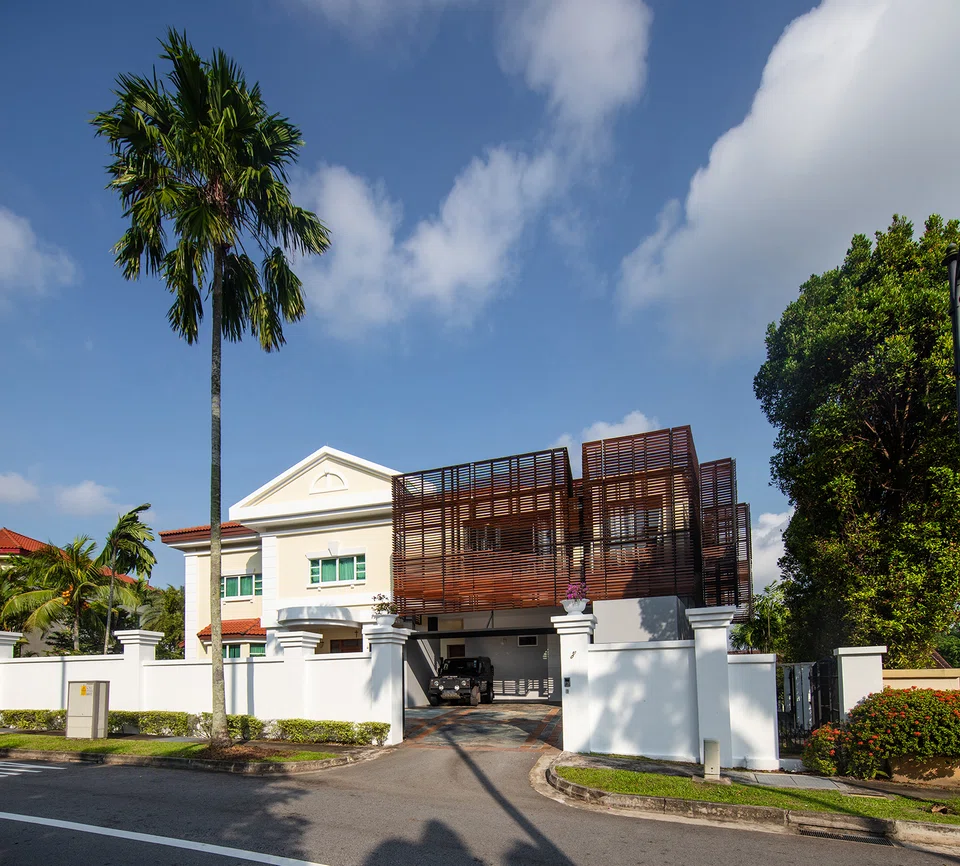 This multigenerational home comprises an existing house and a new addition.