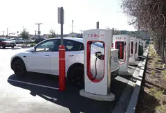 Tesla Superchargers are seen in San Rafael, California, Feb 15, 2023. By late 2024, Tesla would open 3,500 new and existing Superchargers along highway corridors to non-Tesla customers.